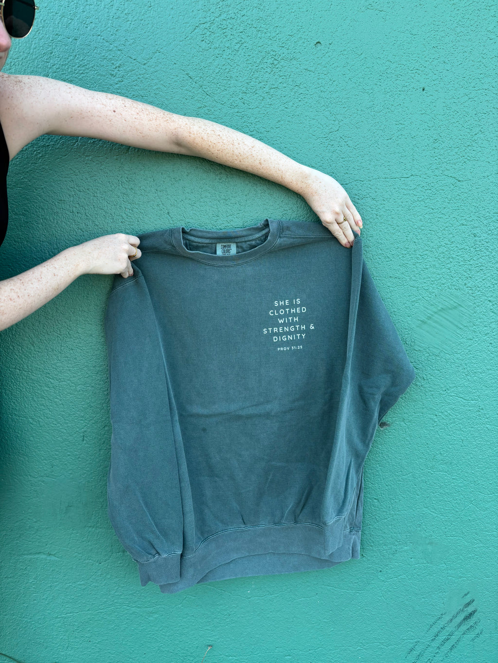 Strength + Dignity Sweatshirt
